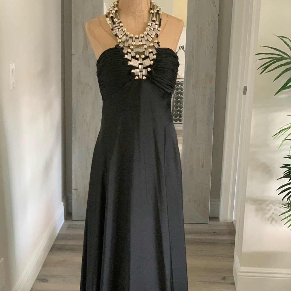Gold necklace black silk gown